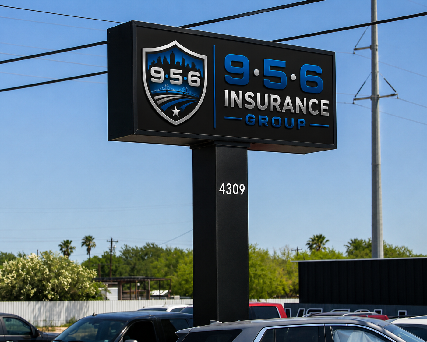 956 Insurance Group illuminated street sign at 4309